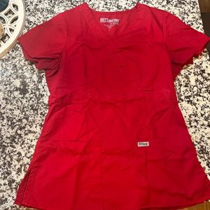 Greys anatomy red scrub top, size small. Hardly worn.